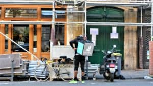 How does Deliveroo make money?